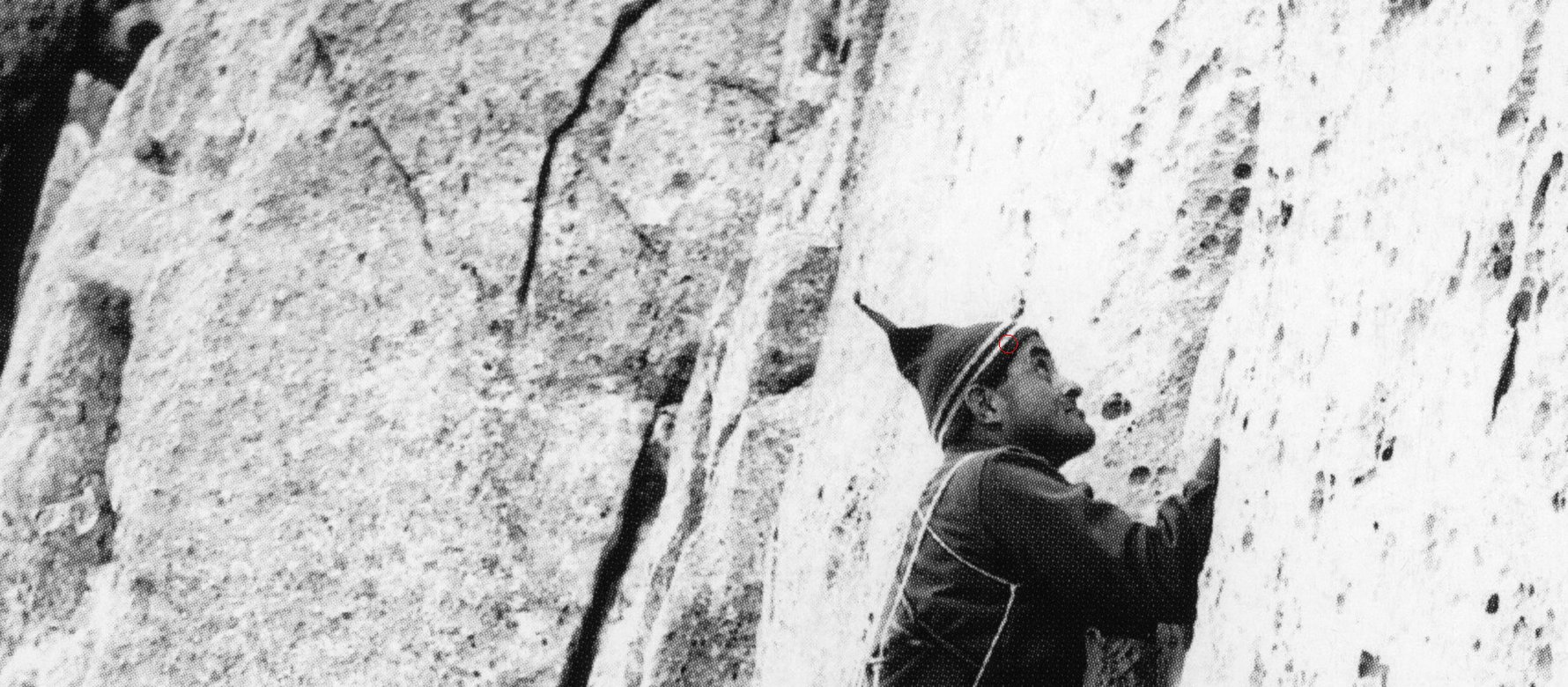 Fotografia storica di arrampicatore su placca